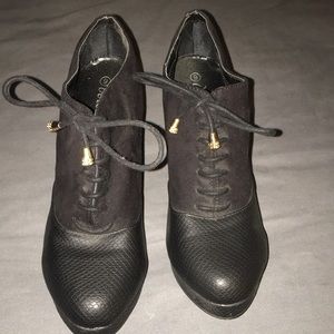 Black leather and suede high heels